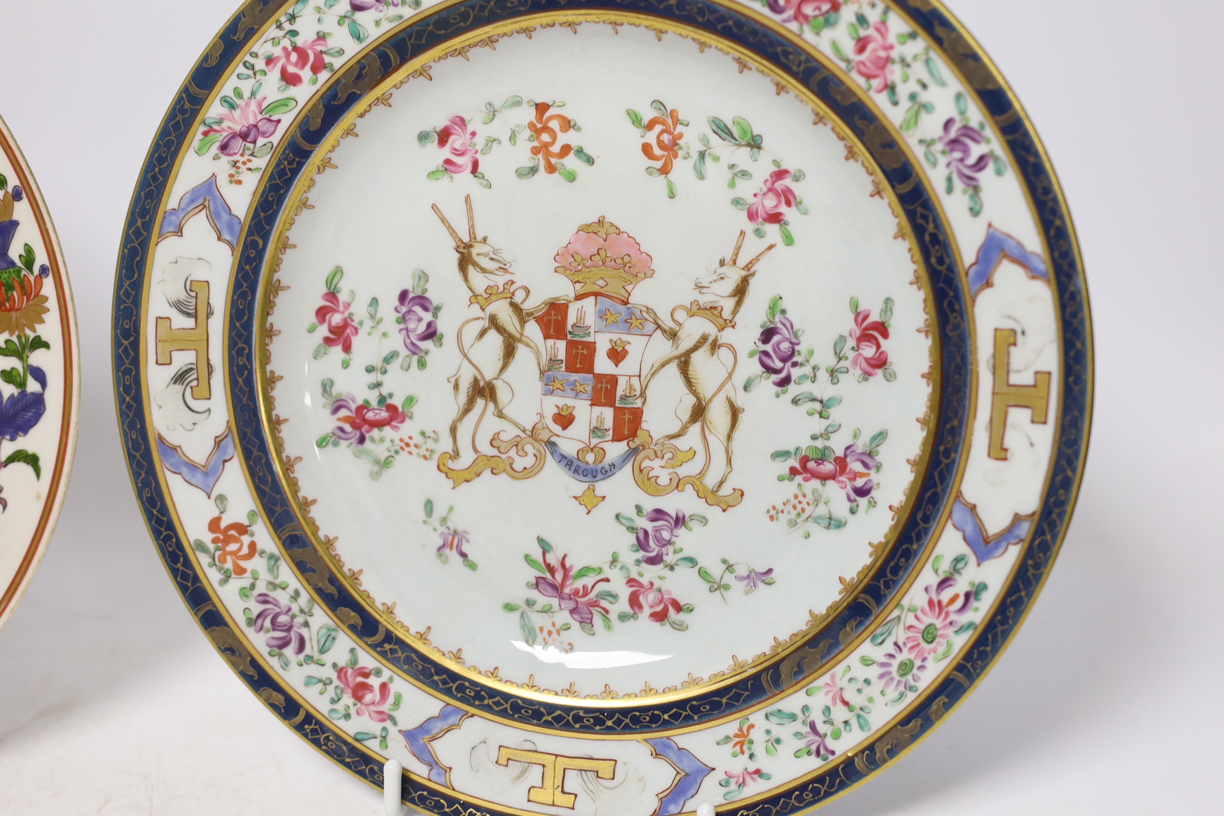 Two Samson of Paris famille rose style dishes, painted with European armorials, largest 24cm diameter (2). Condition - good, some wear to decoration